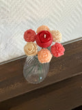 Vase + fleurs de cire parfumée